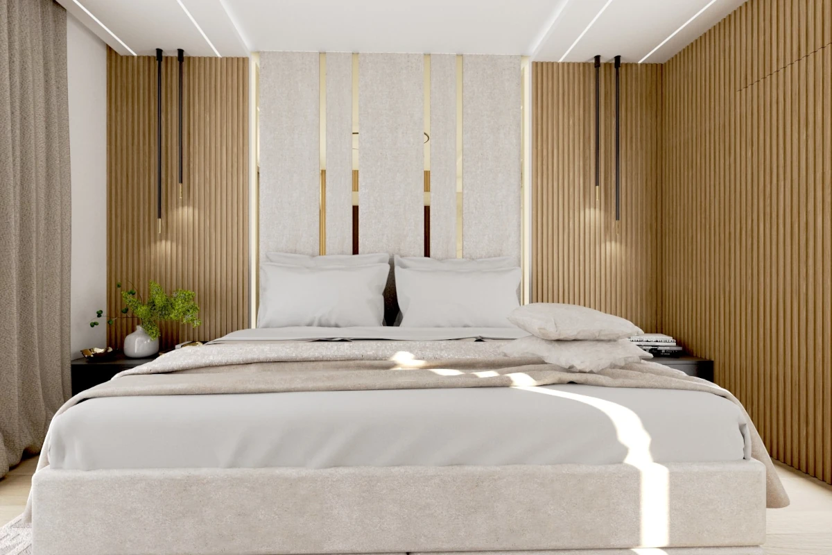 Łóżko w sypialni z drewnianymi dekorami. Dodatki na łóżko oraz zasłony w kolorze beżowym.